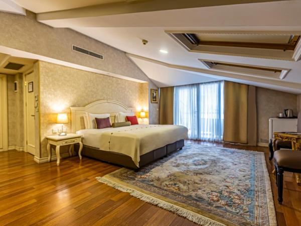 Eurostars Hotel Old City : photo 4 de la chambre suite avec balcon