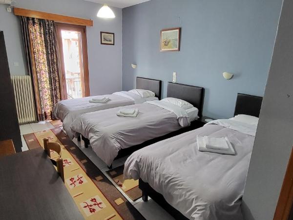 Domus Inn : photo 1 de la chambre chambre triple