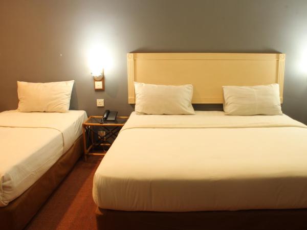 Sandakan Inn : photo 4 de la chambre chambre triple deluxe