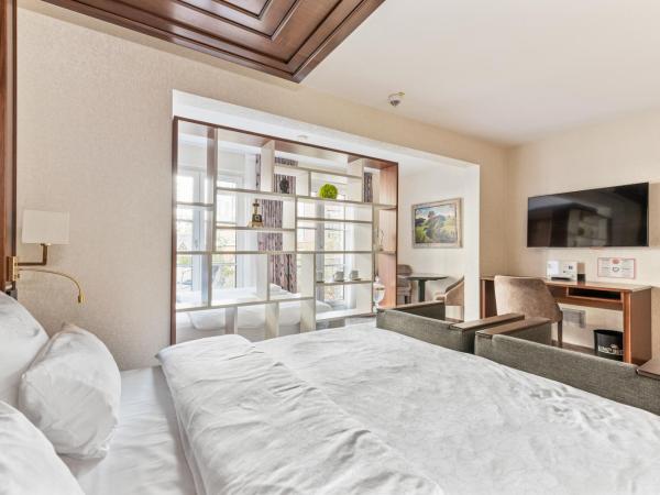 AdvaStay by KING's : photo 8 de la chambre chambre familiale supérieure