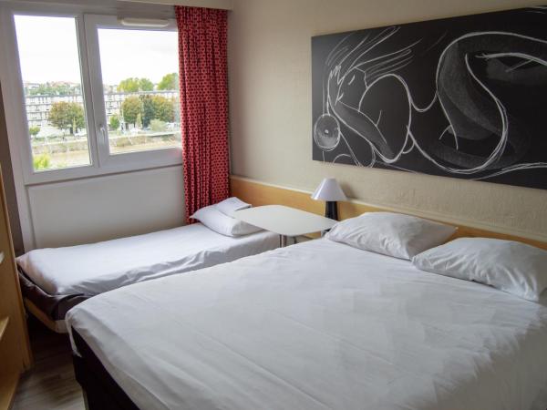 ibis Boulogne sur Mer Centre les Ports : photo 5 de la chambre chambre double avec lit d’appoint enfant