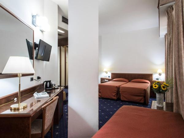 Hotel Mirage : photo 4 de la chambre chambre quadruple