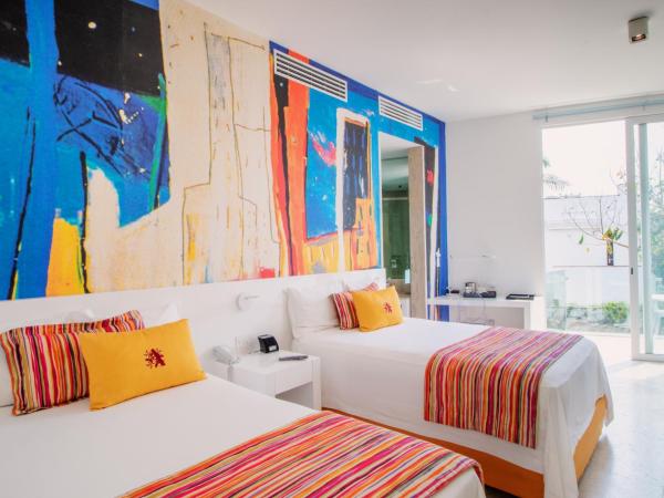 Anticavilla Hotel Restaurante & Spa : photo 1 de la chambre chambre deluxe avec 2 lits doubles