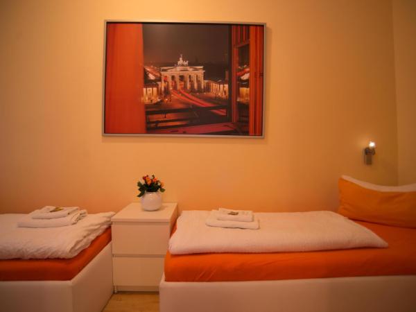 City Guesthouse Pension Berlin : photo 3 de la chambre suite 2 chambres