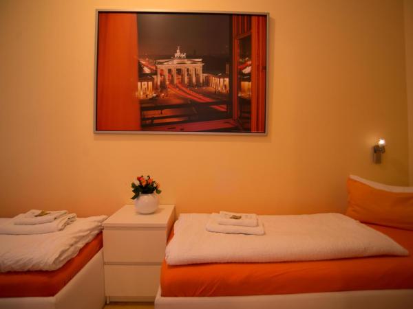 City Guesthouse Pension Berlin : photo 6 de la chambre suite familiale 2 chambres