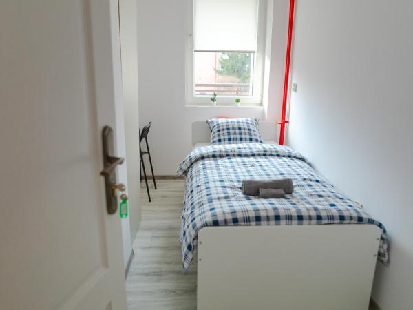 LoftMe Houses Hostel : photo 2 de la chambre chambre simple avec salle de bains commune