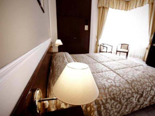 Hotel Continental : photo 2 de la chambre chambre double ou lits jumeaux