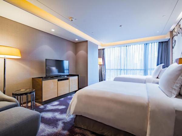 Four Seasons Hotel Shenzhen : photo 1 de la chambre suite deluxe avec 2 lits doubles