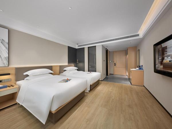Fengyue Light Shang Hotel Guangzhou Baiyun Airport Store : photo 1 de la chambre chambre double ou lits jumeaux