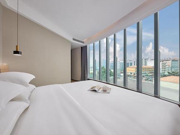 Fengyue Light Shang Hotel Guangzhou Baiyun Airport Store : photo 2 de la chambre suite