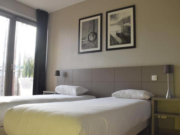 Adonis Lyon Dock Ouest : photo 2 de la chambre chambre lits jumeaux