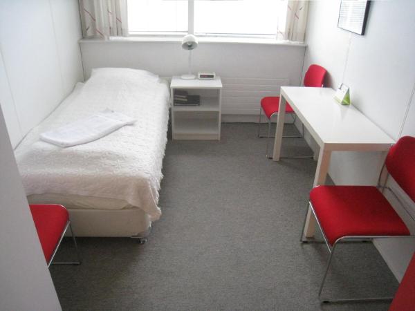 101 Guesthouse Hotel : photo 1 de la chambre chambre simple avec salle de bains commune