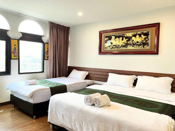Longzhu Guesthouse : photo 4 de la chambre chambre triple deluxe