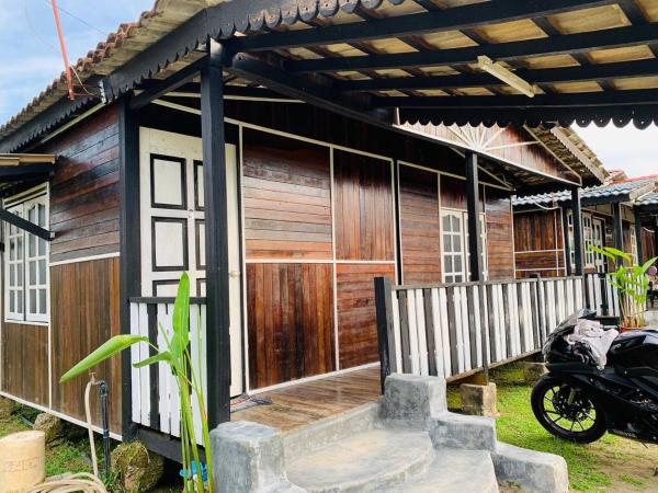 MOSS HEDERA HIDE CHALET : photo 1 de la chambre chambre lit queen-size