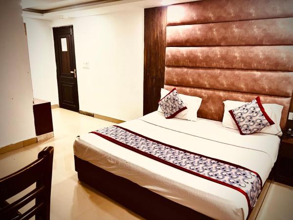 Hotel Cozy Cave Delhi Aiport : photo 4 de la chambre chambre deluxe double ou lits jumeaux