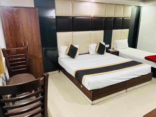 Hotel Cozy Cave Delhi Aiport : photo 5 de la chambre chambre deluxe double ou lits jumeaux
