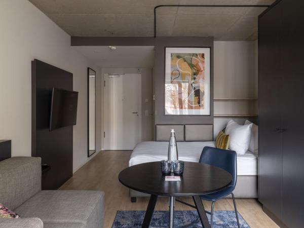 numa I Stark Rooms & Apartments : photo 9 de la chambre medium studio with kitchen and balcony - single bed