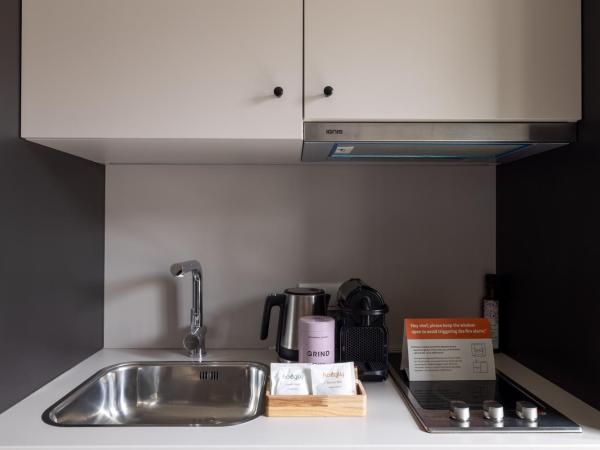 numa I Stark Rooms & Apartments : photo 6 de la chambre medium studio with kitchen and balcony - single bed