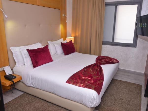 Le 135 appart hotel : photo 1 de la chambre appartement - vue sur jardin