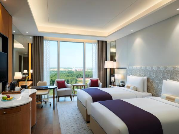 The Leela Bhartiya City Bengaluru : photo 4 de la chambre chambre lits jumeaux