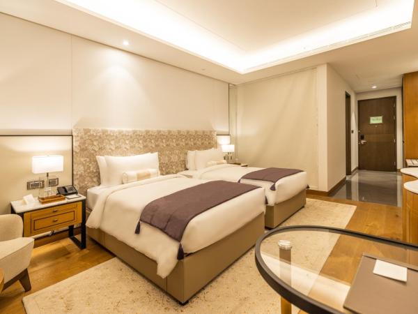 The Leela Bhartiya City Bengaluru : photo 2 de la chambre chambre lits jumeaux