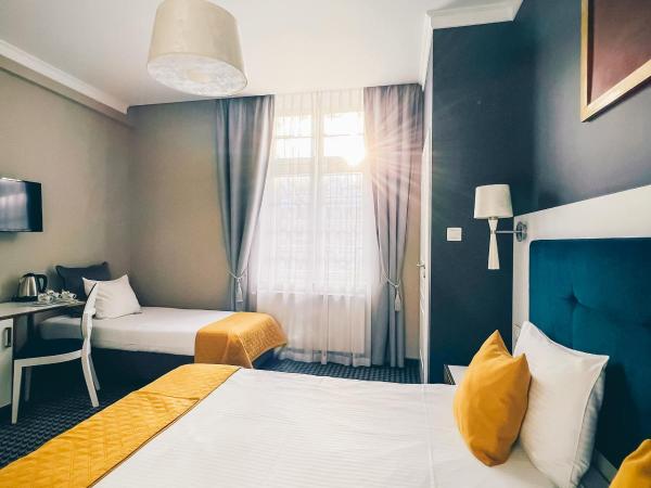 Villa Art Novis : photo 4 de la chambre chambre triple