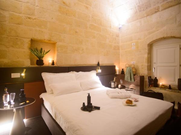 Le Malve Cave Retreat : photo 1 de la chambre suite familiale