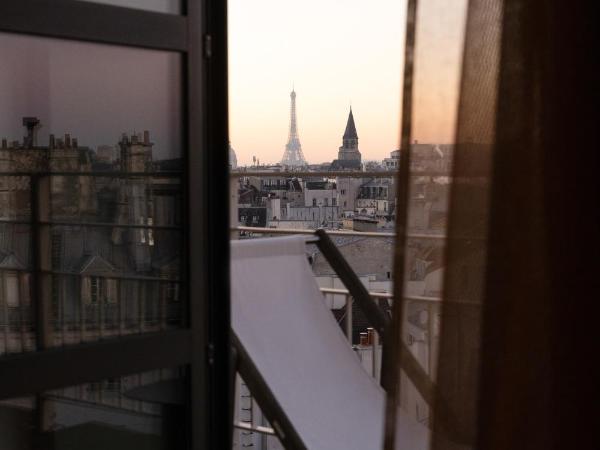 Hôtel Dame des Arts : photo 1 de la chambre chambre 