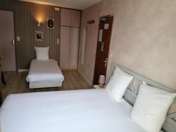 Hôtel Le Lievre Blanc : photo 1 de la chambre chambre triple