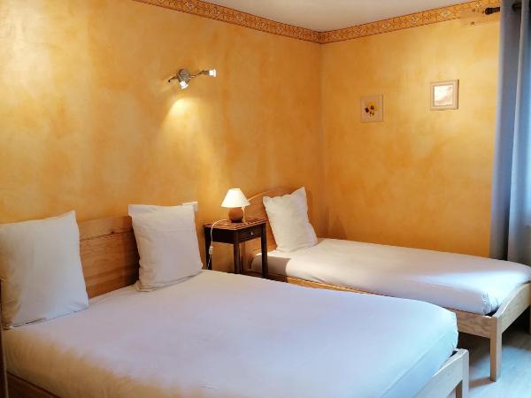 Hôtel Le Lievre Blanc : photo 1 de la chambre chambre triple avec baignoire