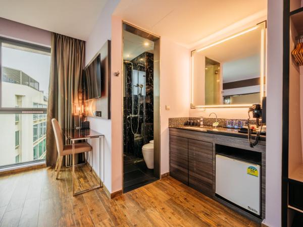 Mercure Singapore Tyrwhitt : photo 10 de la chambre chambre familiale classique avec 1 lit double et 1 lit simple