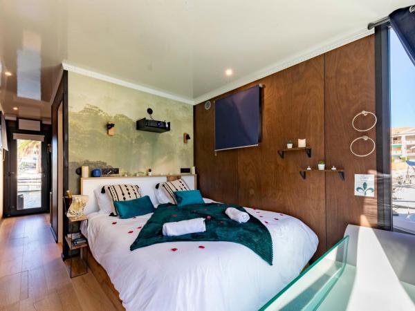 Escale Royale Frejus : photo 3 de la chambre suite lit king-size avec baignoire spa