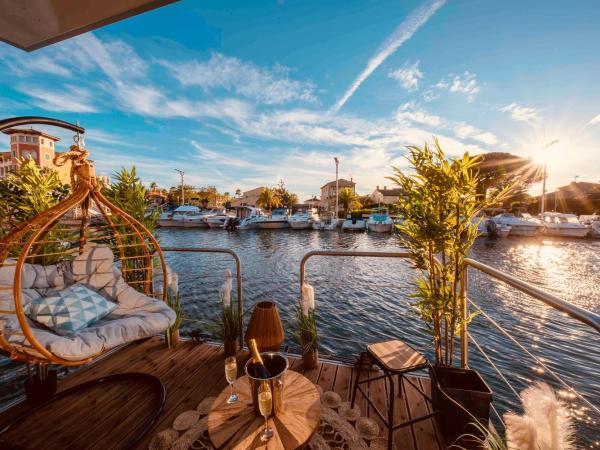 Escale Royale Frejus : photo 2 de la chambre suite lit king-size avec baignoire spa