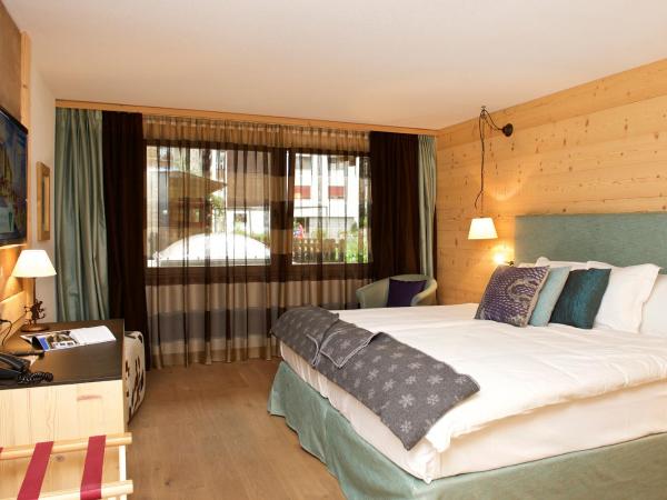 Matterhorn Lodge Boutique Hotel & Apartments : photo 8 de la chambre chalet avec chambre double