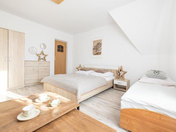 Willa Dunajec : photo 6 de la chambre chambre quadruple avec balcon 
