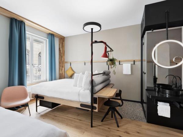 Stay KooooK Bern City - Online Check In : photo 1 de la chambre chambre triple de luxe