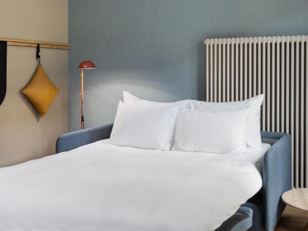 Stay KooooK Bern City - Online Check In : photo 9 de la chambre chambre familiale supérieure