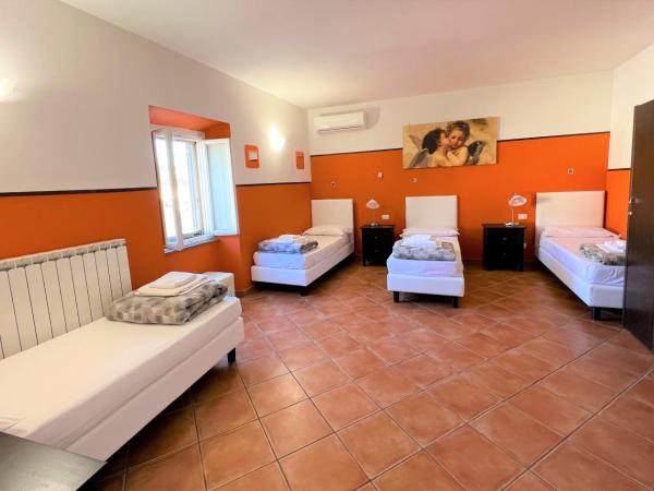 Emerald Palace : photo 2 de la chambre chambre quadruple avec salle de bains privative