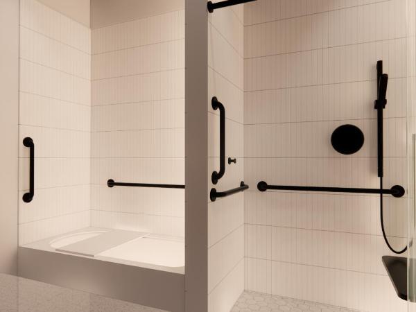 The Myriad Hotel : photo 5 de la chambre suite deluxe avec lit king-size