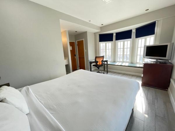 Marina Inn : photo 6 de la chambre chambre lit queen-size deluxe