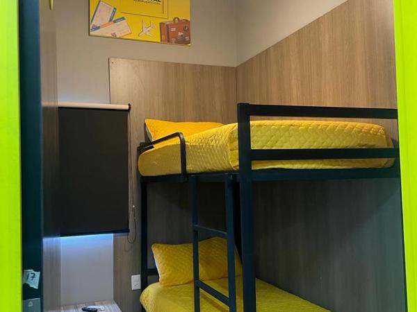 CHECK INN HOSTAL AEROPUERTO GDL : photo 2 de la chambre chambre lits jumeaux Économique