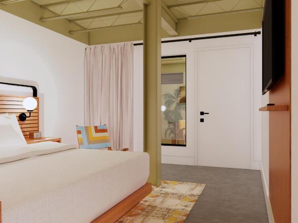 The Myriad Hotel : photo 3 de la chambre suite lit king-size