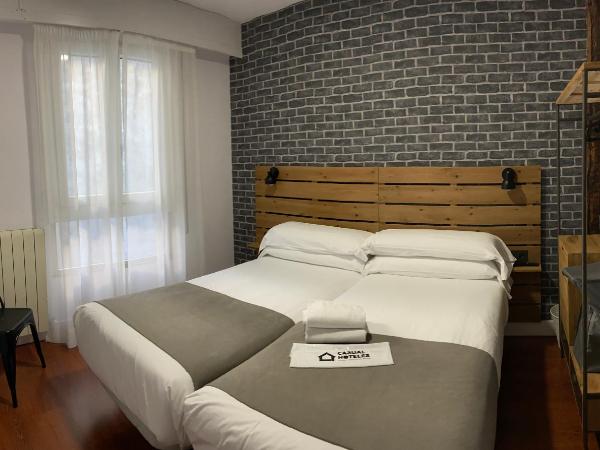 Casual Mardones : photo 8 de la chambre chambre lits jumeaux avec salle de bains privative