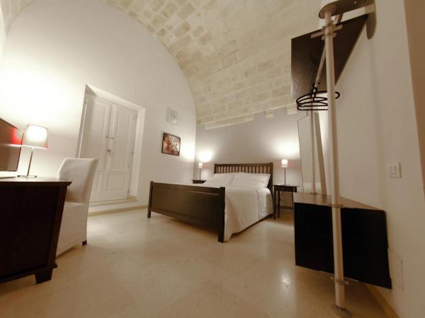 Le Malve Cave Retreat : photo 1 de la chambre chambre triple avec balcon