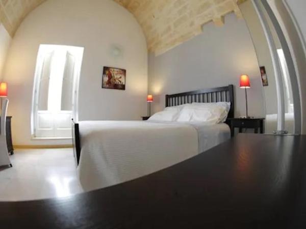 Le Malve Cave Retreat : photo 2 de la chambre chambre triple avec balcon