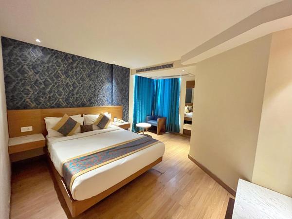 The Orion Plaza - Nehru Place : photo 1 de la chambre suite familiale