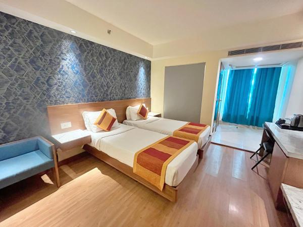 The Orion Plaza - Nehru Place : photo 9 de la chambre chambre deluxe double ou lits jumeaux