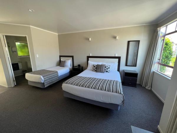 Quality Inn Acapulco Taupo : photo 4 de la chambre studio jardin privé