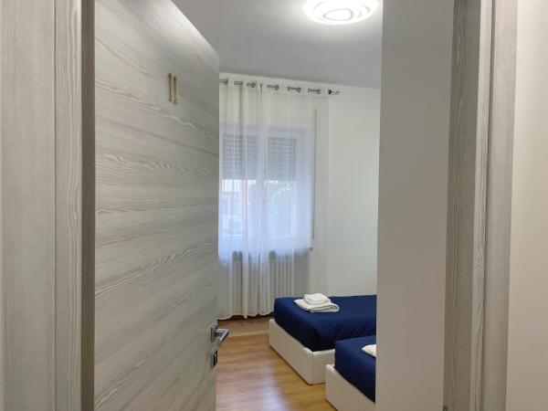 Nuovo Confortini Rooms SUNDAY : photo 5 de la chambre chambre lits jumeaux