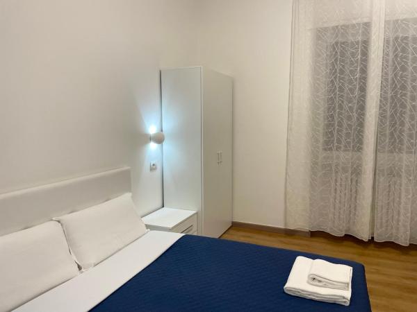 Nuovo Confortini Rooms SUNDAY : photo 9 de la chambre chambre triple